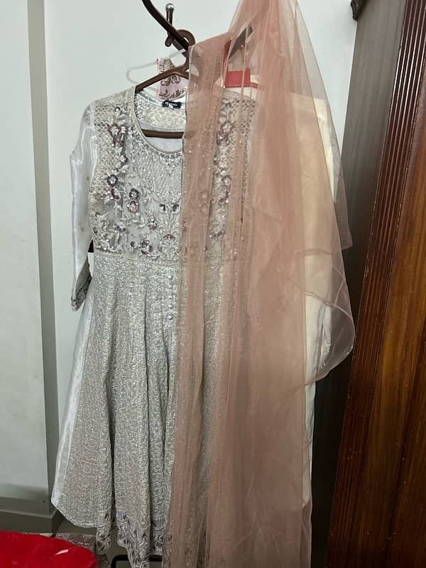 nakoosh brand frock for sell with pajama and net dupatta 0