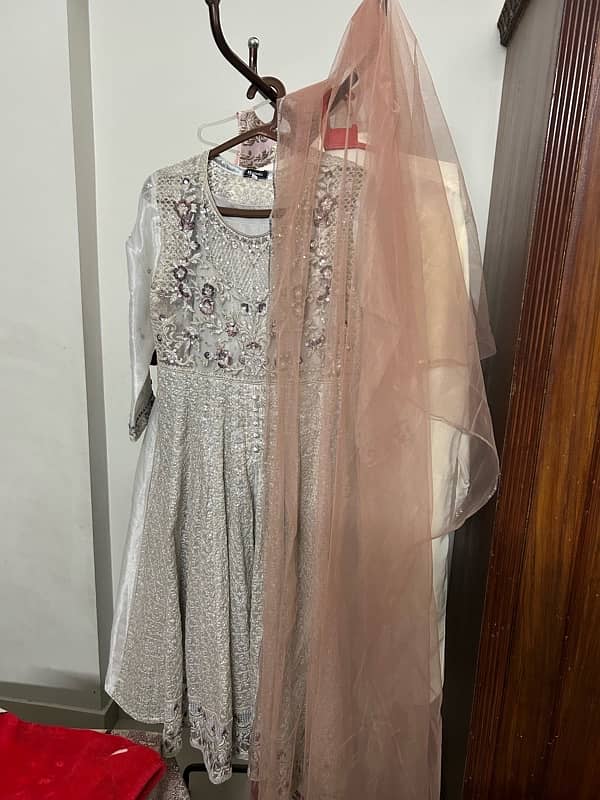 nakoosh brand frock for sell with pajama and net dupatta 2