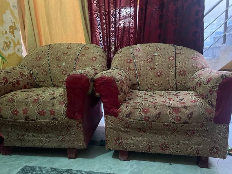 sofa with hard wood and condition is good 0