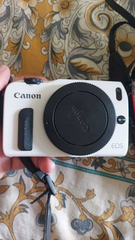 Canon EOS M with 22mm f2 & 18-55mm 0