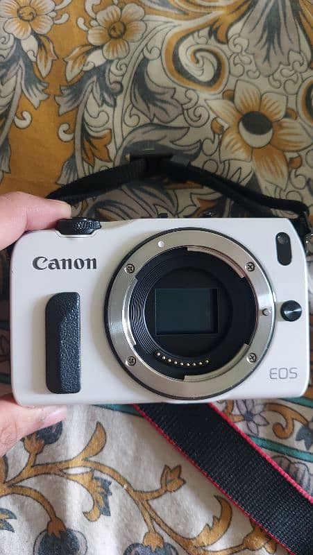 Canon EOS M with 22mm f2 & 18-55mm 3