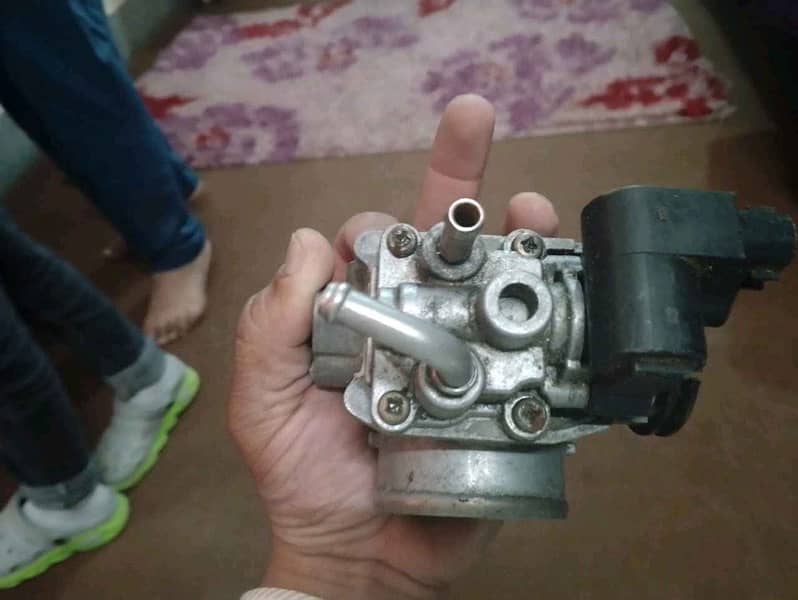 Suzuki liana ignition coil and throttle body for sale 4