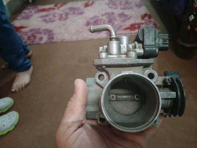 Suzuki liana ignition coil and throttle body for sale 5