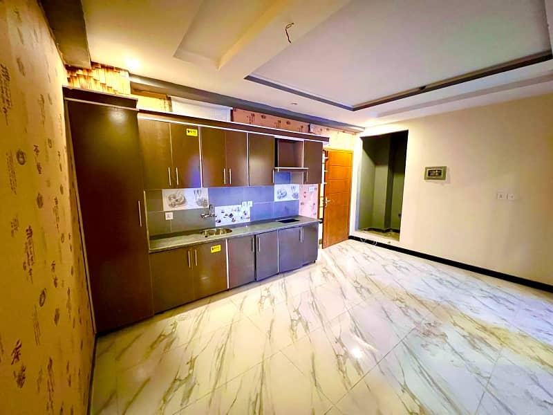 2 BED LUXURY BRAND FLAT FOR SALE F-17 ISLAMABAD ALL FACILITY AVAILABLE 4