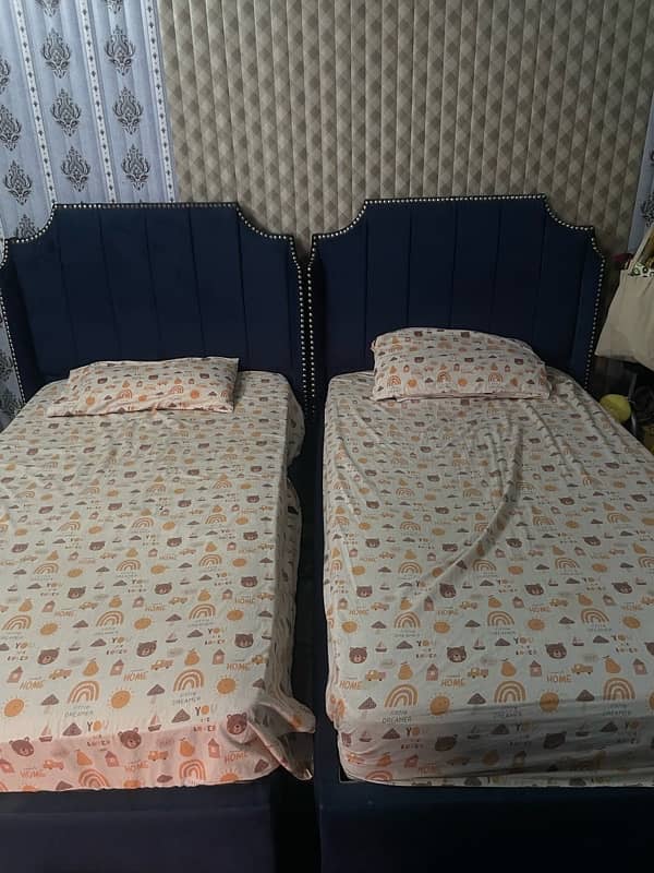 2 single bed with center table 1