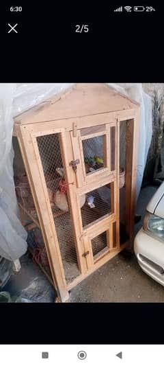 New wooden cage sale with beautiful parrots