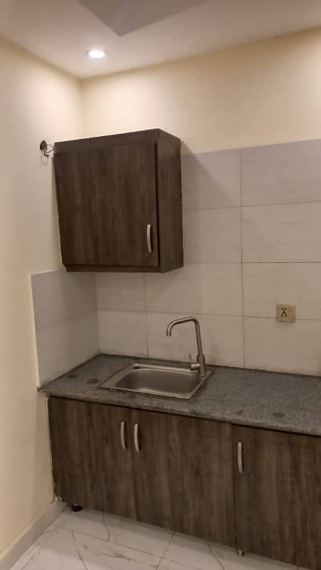 STUDIO LIKE A BRAND NEW EXCELLENT GOOD CONDITION FLAT FOR RENT IN NISHTER BLOCK BAHRIA TOWN LAHORE 6