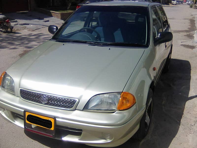 SUZUKI CULTUS VXR MODEL 2001 KING GOLD COLOUR BEHTREEN CONDITION 12