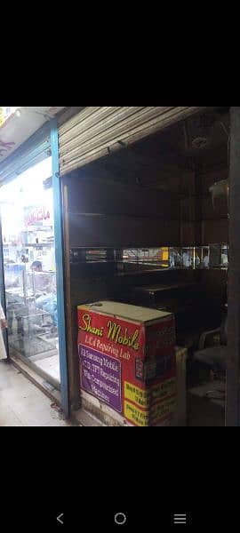 shop for sale  at main hall road beside usama center hall road 5