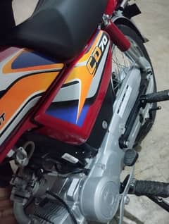 red colour Honda 70 total geniun  urgent sale