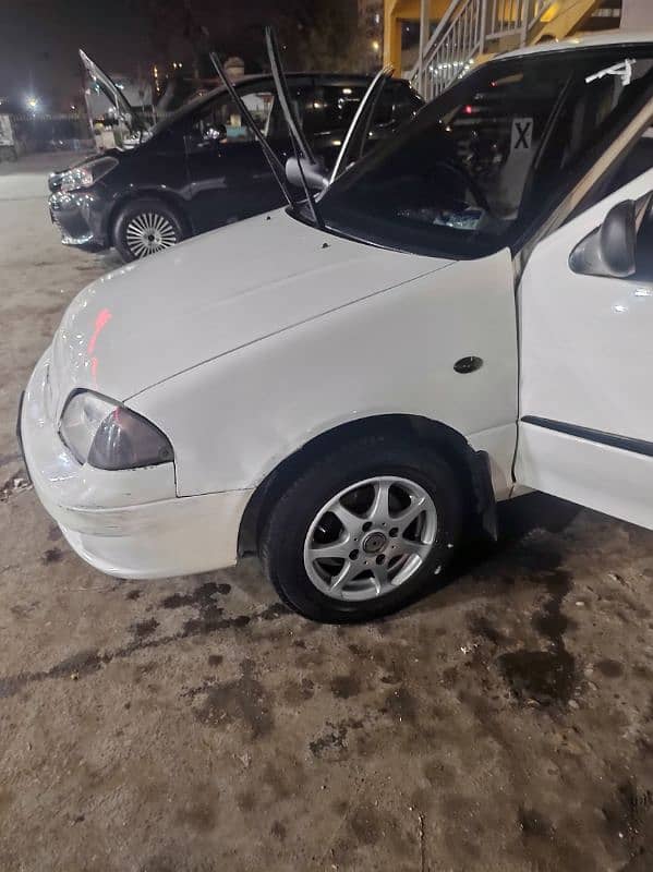 Suzuki Cultus VXL 2010 White Own Engine, AC, Power Window and Steering 9