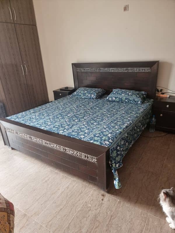 Wooden bed with two side tables 0