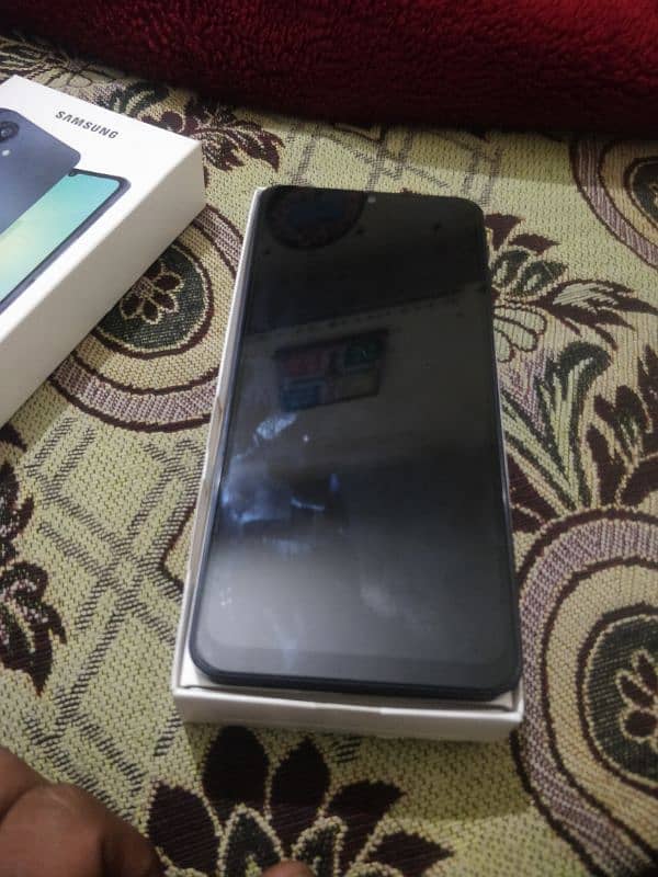 samsung mobile A06 in new condition and new version with box 7