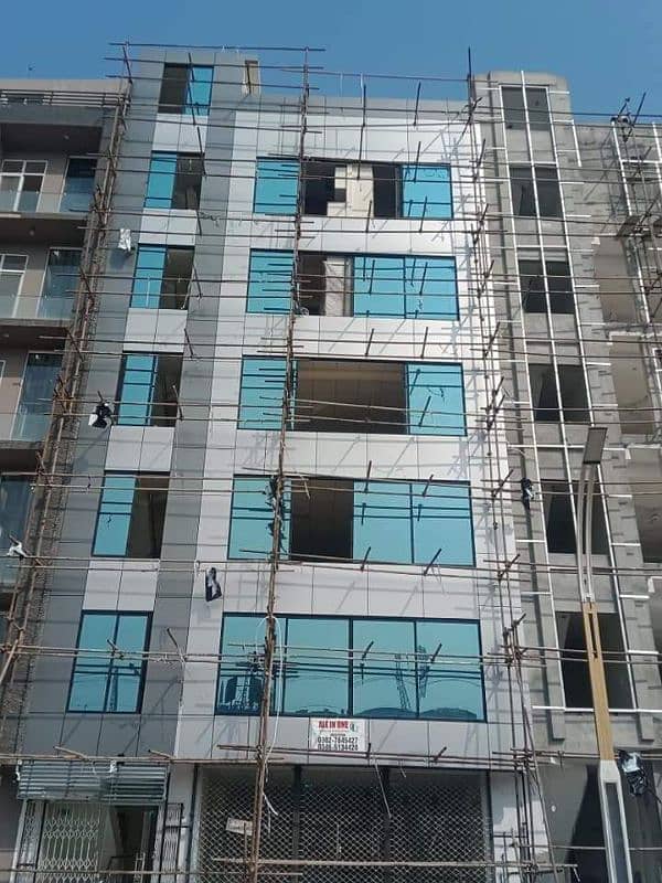 Wall cladding sheet and curtain wall, spider glass fitting 15
