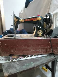 one hand used sewing machine