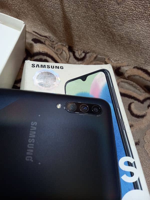 Samsung a30s 4gb 128gb with imei match box and charger pta approved 2