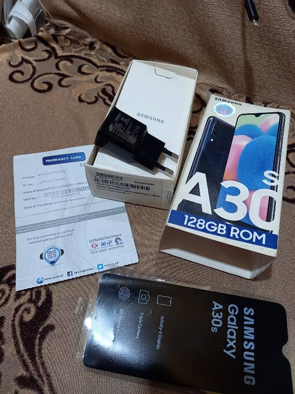 Samsung a30s 4gb 128gb with imei match box and charger pta approved 16