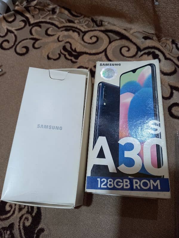 Samsung a30s 4gb 128gb with imei match box and charger pta approved 17