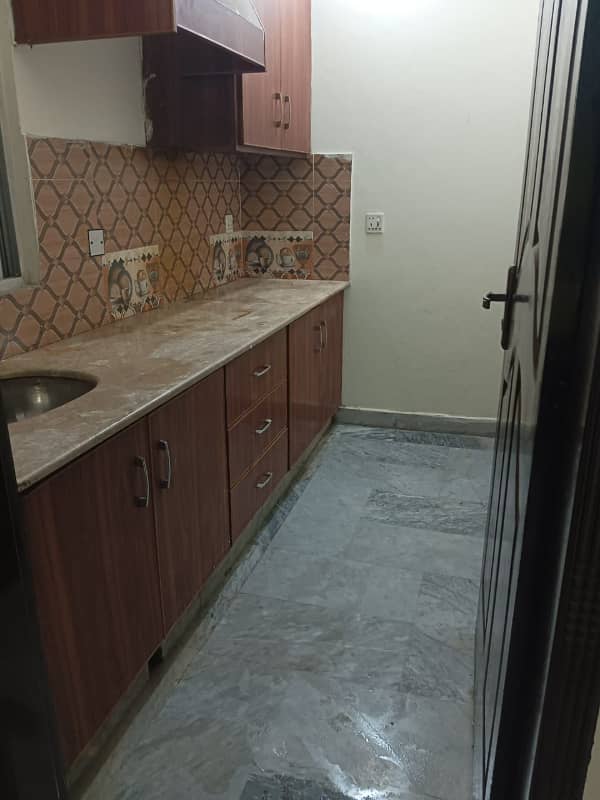 Lower portion for rent 1bad attach bathroom TV launch kitchen marble flooring wood wark 5