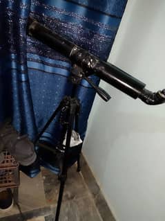 60/700 Refractor Telescope With Heavy aluminum Tripod Eyepieces also