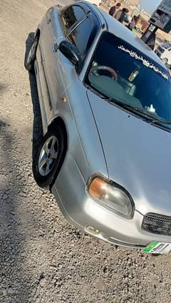 Suzuki Baleno 2004 last month family used car