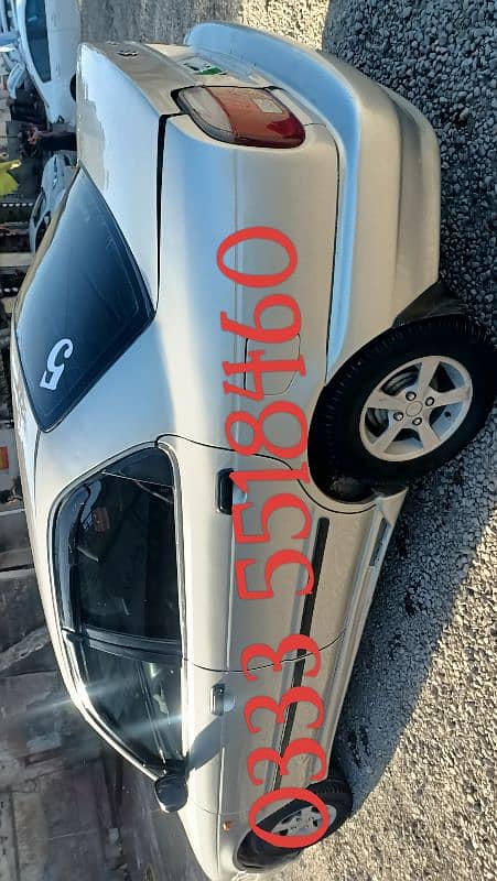 Suzuki Baleno 2004 last month family used car 3