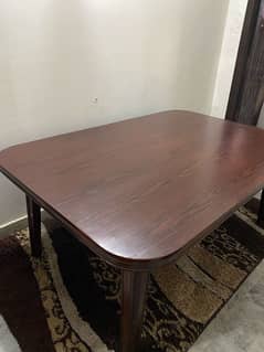 Dinning table 6 seater in sheesham wood material.