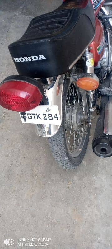 Honda125 model 2013 Punjab three digit no 284 price 99000 Kamra 1