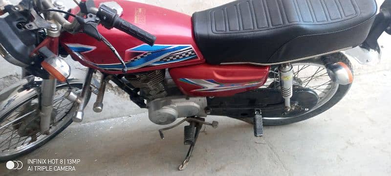 Honda125 model 2013 Punjab three digit no 284 price 99000 Kamra 2