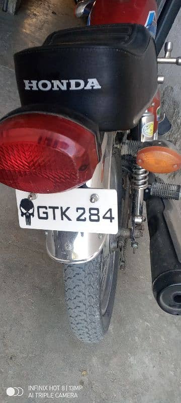 Honda125 model 2013 Punjab three digit no 284 price 99000 Kamra 3