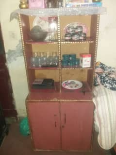 Cupboard for kitchen utensils and cosmatics