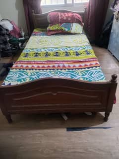 wooden single bed