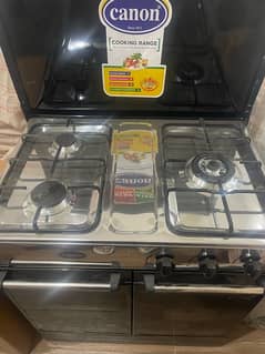 canon cooking range with cabinets