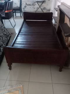 single wooden bed