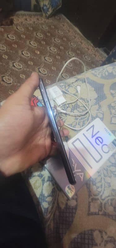 hello im salling my tecno pova new 2 7 gb ram 128 room cmplet saman 4