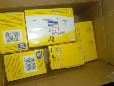 Libre 2 sensors and Libre 1 reader. Canadian, sealed