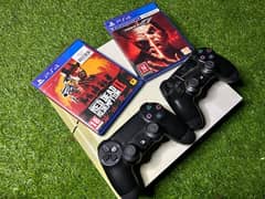 ps4 with two controllers and games