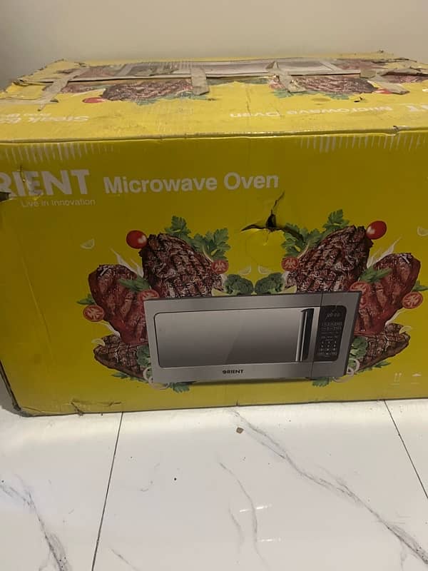 Selling my new microwave 1