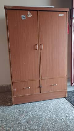 Wooden table , dressing and cupboard