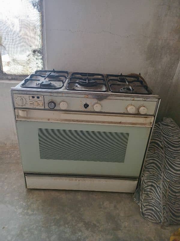 5 stove with oven good condition glass door Eqson  company 1