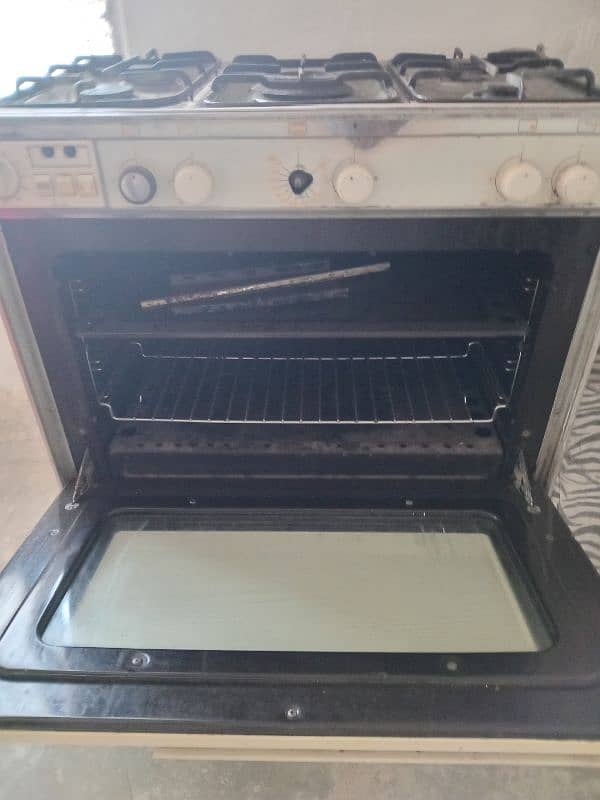 5 stove with oven good condition glass door Eqson  company 2