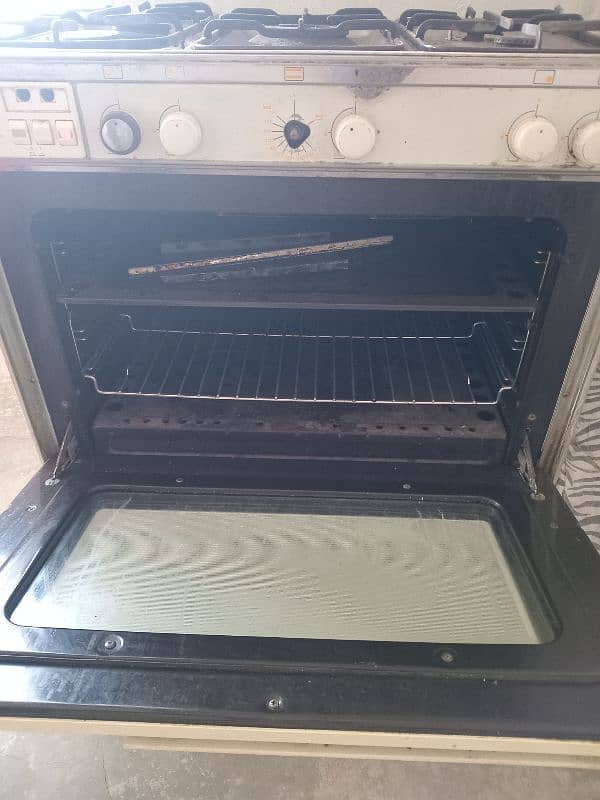 5 stove with oven good condition glass door Eqson  company 3