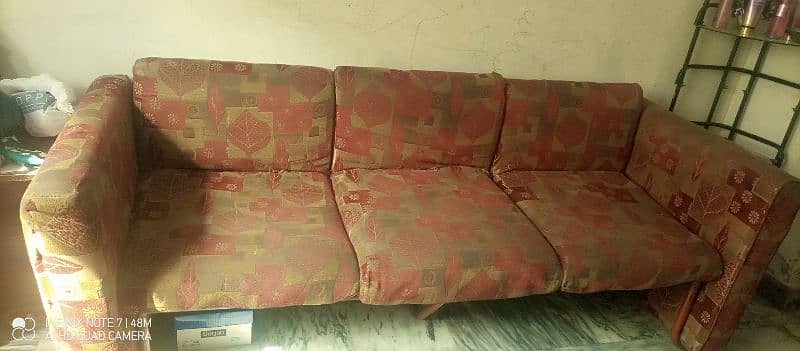 sofa with steal stand 0