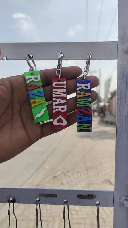 name key chain . chawal k Dany per name lakwahy 0