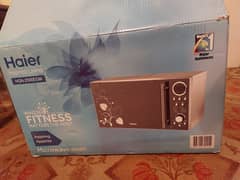 Brand new haier microwave oven glass front