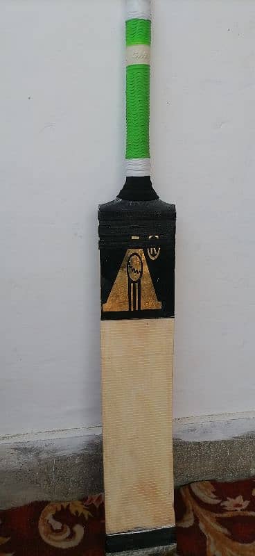 Cricket Rawalkoti wooden tapeball bat. 1