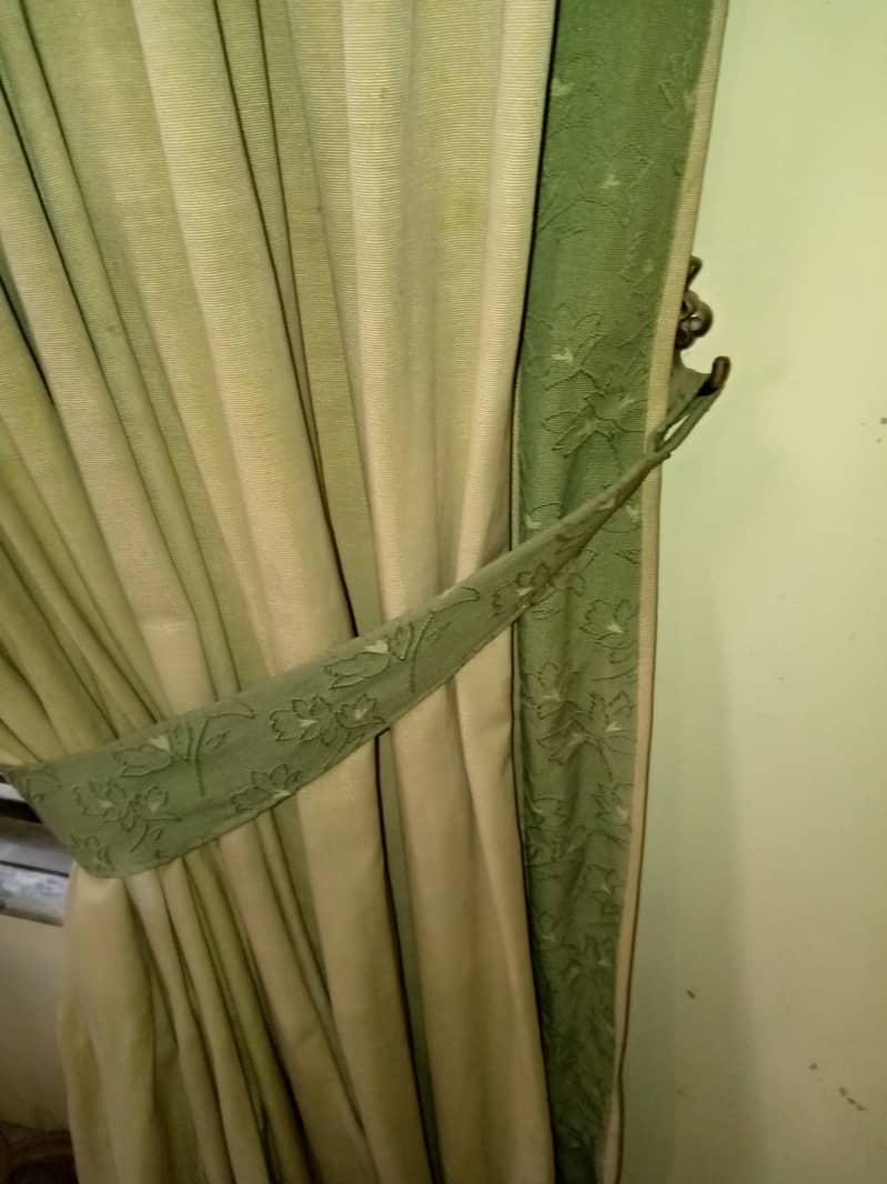 Golden curtains with light green beautiful border on a throw away pri 0