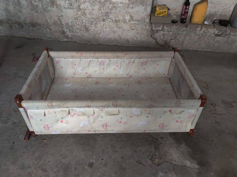 Baby cot In good condition newly polished With mattress 1