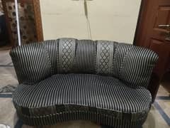 2 seater sofa in black and silver colour