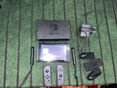 nintendo swich with all accessories that show on photos